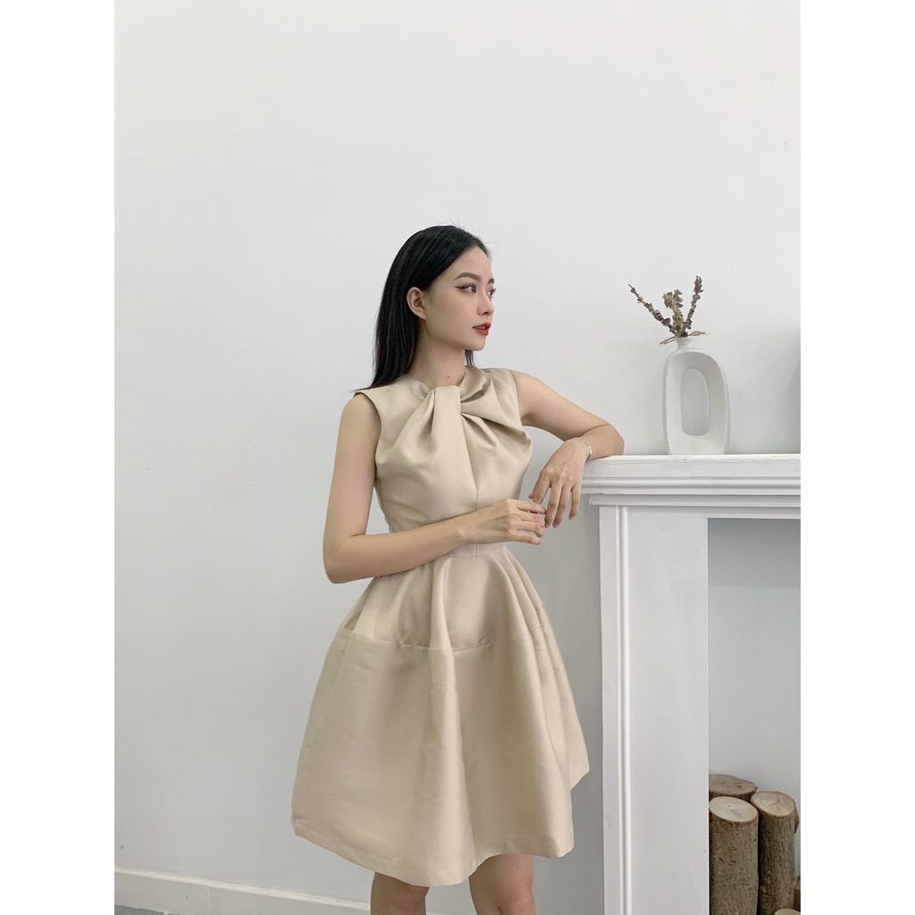 RECHIC Đầm Cổ Xoắn Xòe Không Tay Asma Màu Beige Hiện Đại Sang Trọng