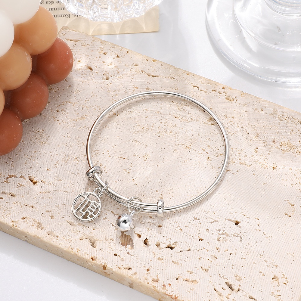 Vòng đeo tay gắn chuông may mắn thời trang cho nữ