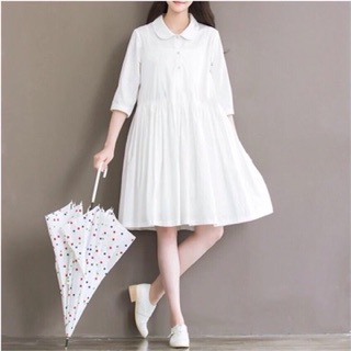 Đầm babydoll trắng nút
