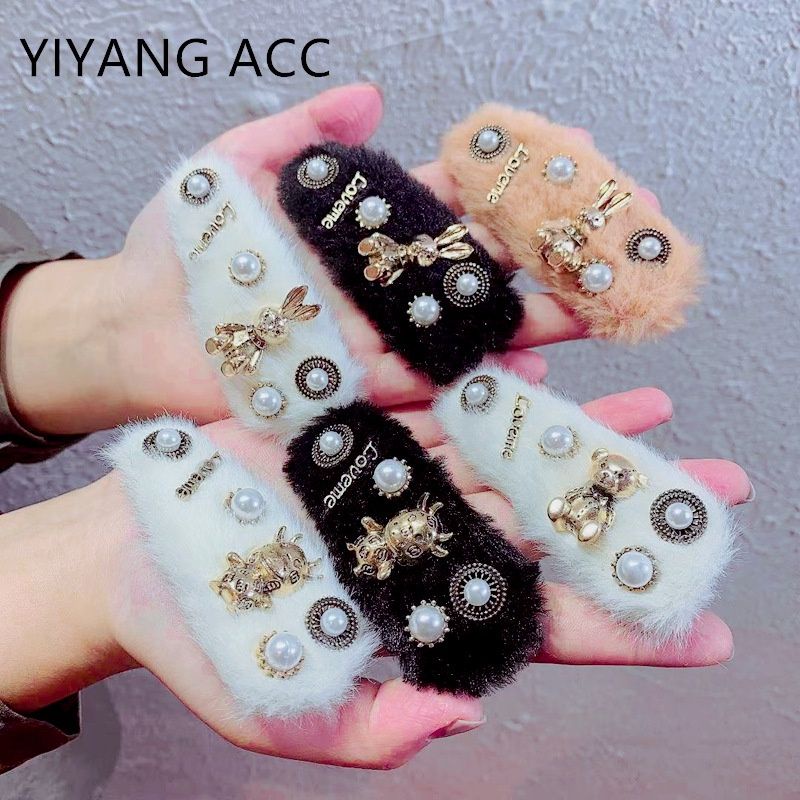 kẹp tóc lông trắng xinh