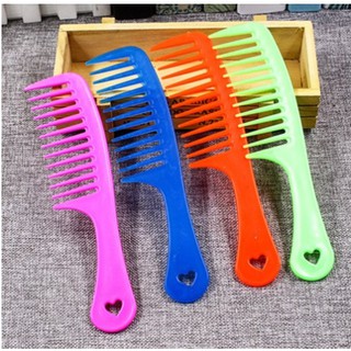 Lược nhựa răng thưa chải tóc