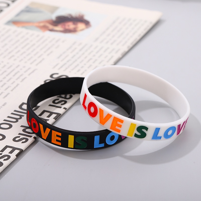 Vòng Tay Cặp Đôi Bằng Cao Su Mềm Màu Trắng Đen Chữ LOVE IS LOVE