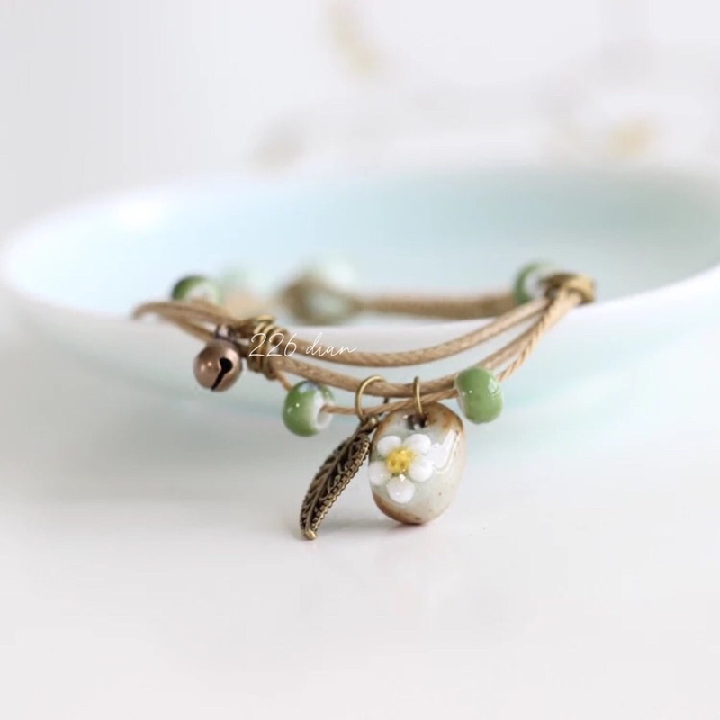 Vòng gốm handmade hoa dài  màu vàng xinh xắn