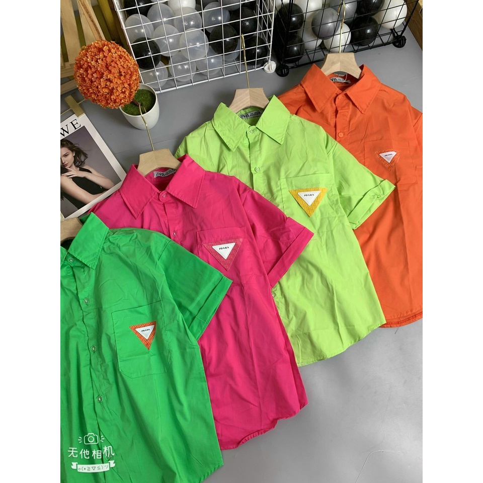 Áo sơ mi nữ trắng cộc tay in túi PRA