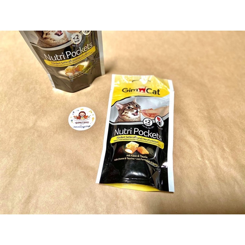 GimCat Nutri Pockets with Cheese and Taurine snack - Bánh quy giòn có nhân với vị phô mai và bổ sung Taurine cho mèo
