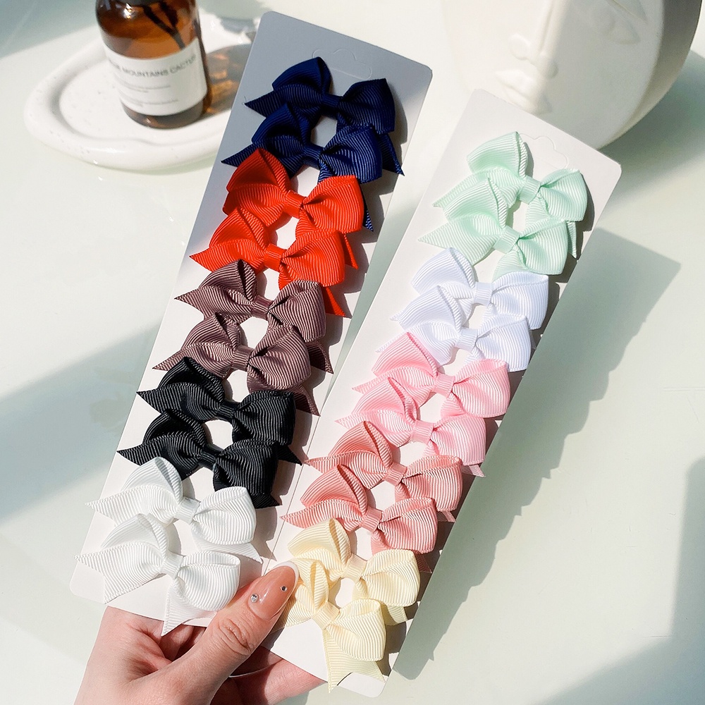 Set 10 kẹp tóc nơ ruy băng KIDSBOWS màu trơn dễ thương cho bé gái