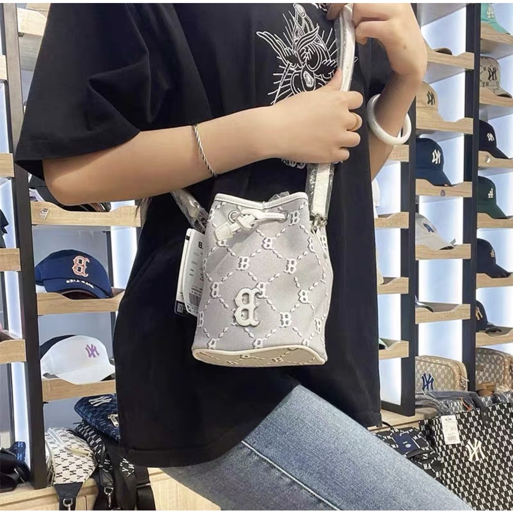 Túi mlb ny đeo chéo nữ mini dây rút thời trang xuất dư xịn DC425