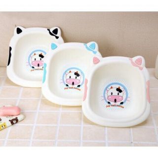 CHẬU RỬA MẶT HÌNH CON BÒ CƯỜI