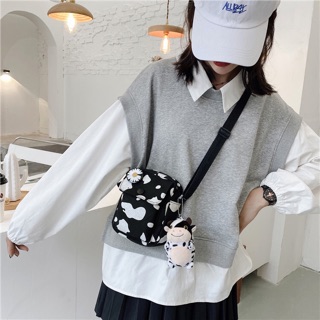 Túi đeo chéo nút bấm bò sữa unisex ( có sẵn)