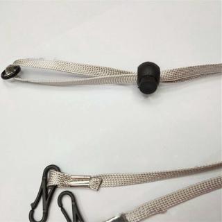 Adjustable strap to attach a ponytail / handy phone hook