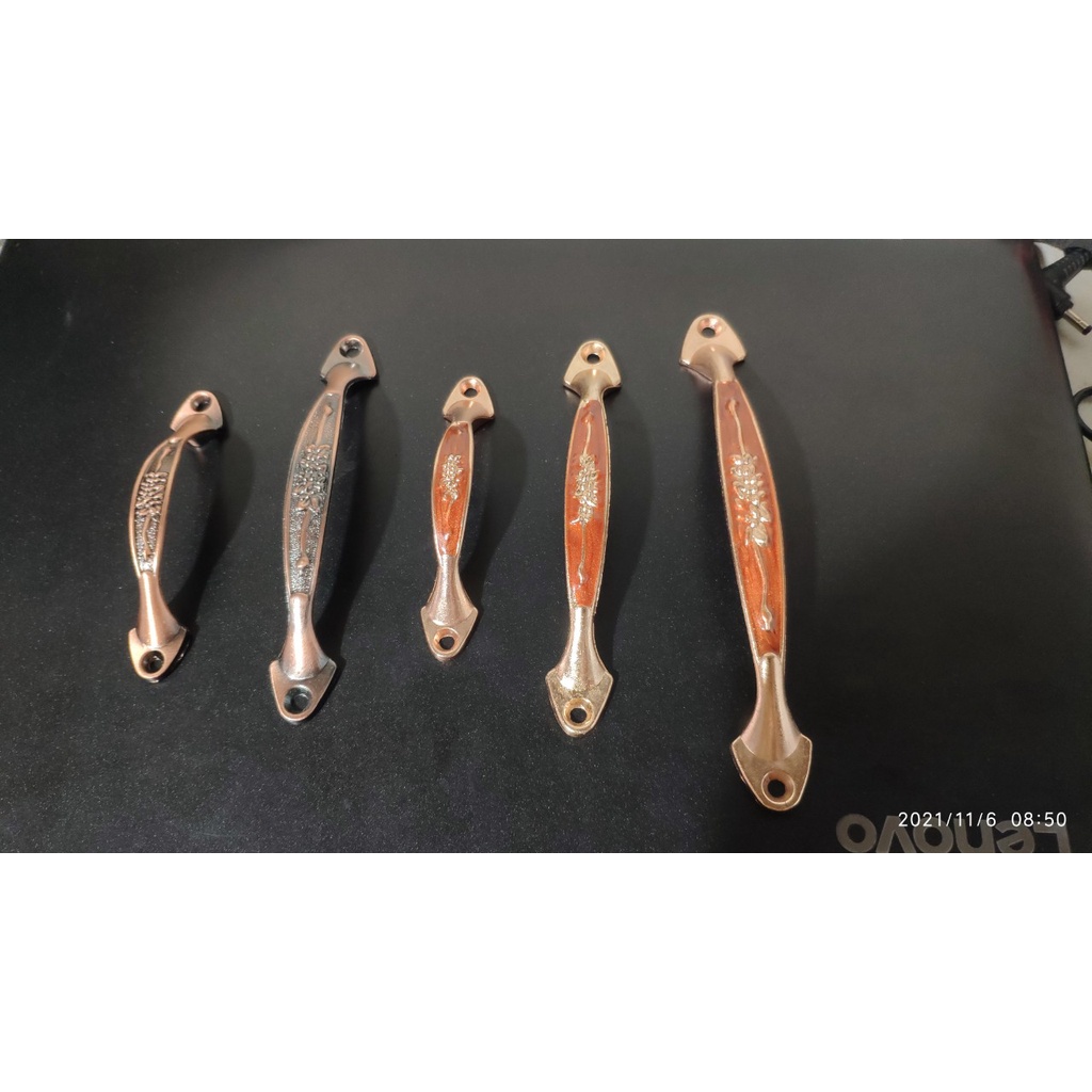 Tay nắm tủ, tay cúc đồng, tay cúc nâu,tay co tủ, tay nắm hoa cúc giá tốt