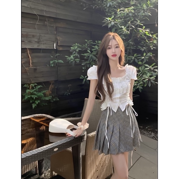 ÁO TRỄ VAI CỘT EO