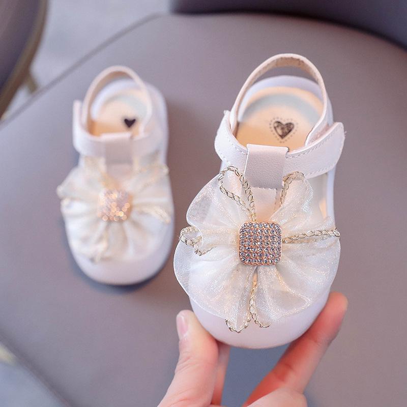 Sandal Nơ Siêu Xinh Mũi Cao Bảo Vệ Chân Bé Cực Mềm Êm Chân