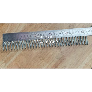 Lò xo nén thanh(đường) ray máy cắt vải đầu bàn(cây)