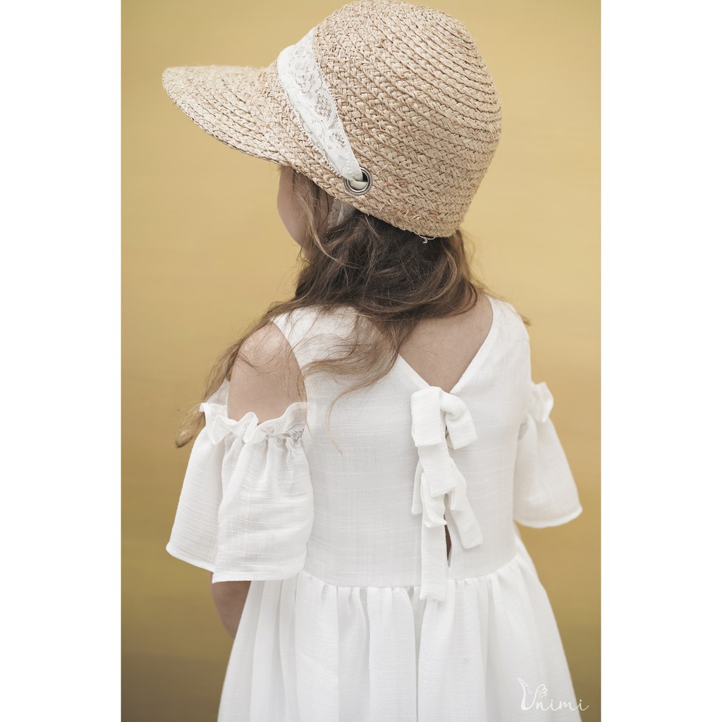 Váy trắng Egg-Drop rớt vai xô linen đính nơ sau lưng 70% OFF