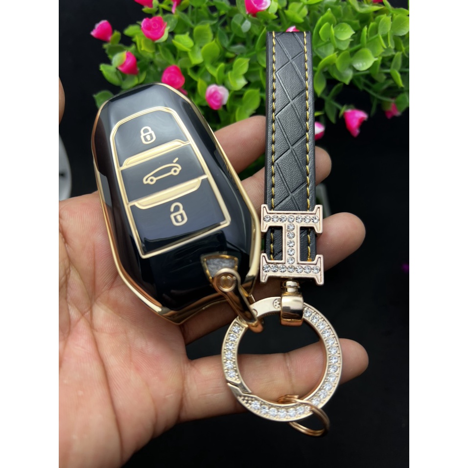 Bọc chìa khóa Peugeot 3008 – 5008 đen vàng sang trọng quý phái.