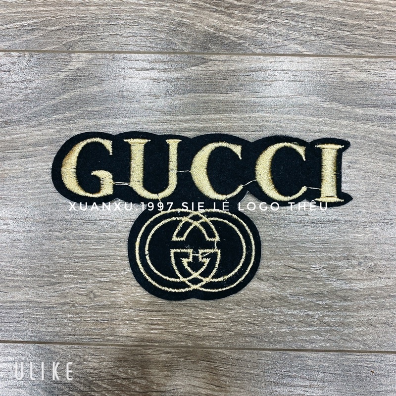 Logo thêu chữ Gucci đính quần áo