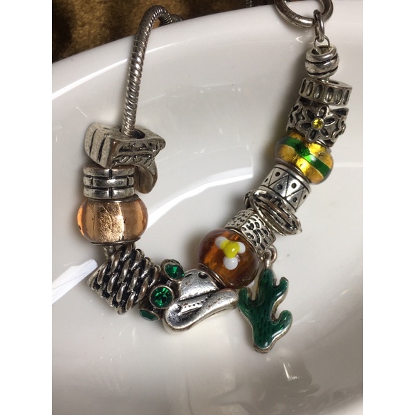 Lắc tay charm vintage-chốt cài then mu ra no