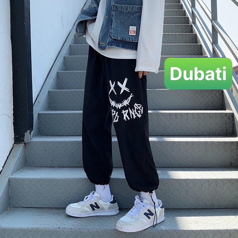 QUẦN JOGGER NAM NỮ UNISEX CHẤT NỈ DÀY DA CÁ ỐNG SUÔNG RỘNG IN HÌNH MẶT CƯỜI SÀNH ĐIỆU -DUBATI FASHION