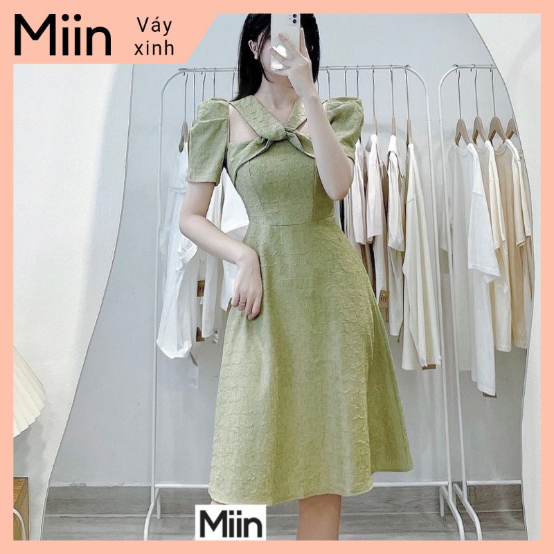Váy xoắn chéo cổ khoét vai