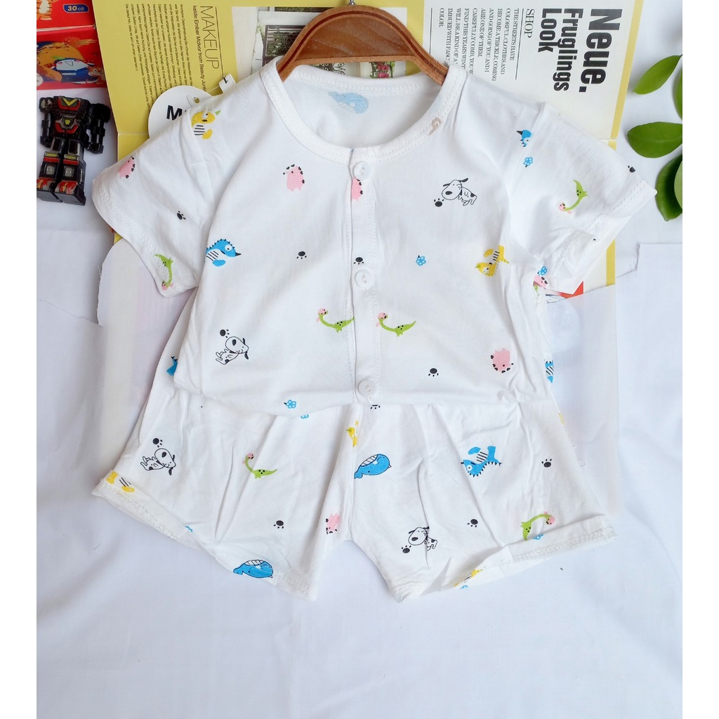 Bộ thun lạnh cộc tay cúc giữa nền TRẮNG hoạt tiết cho bé sơ sinh (4-14kg)