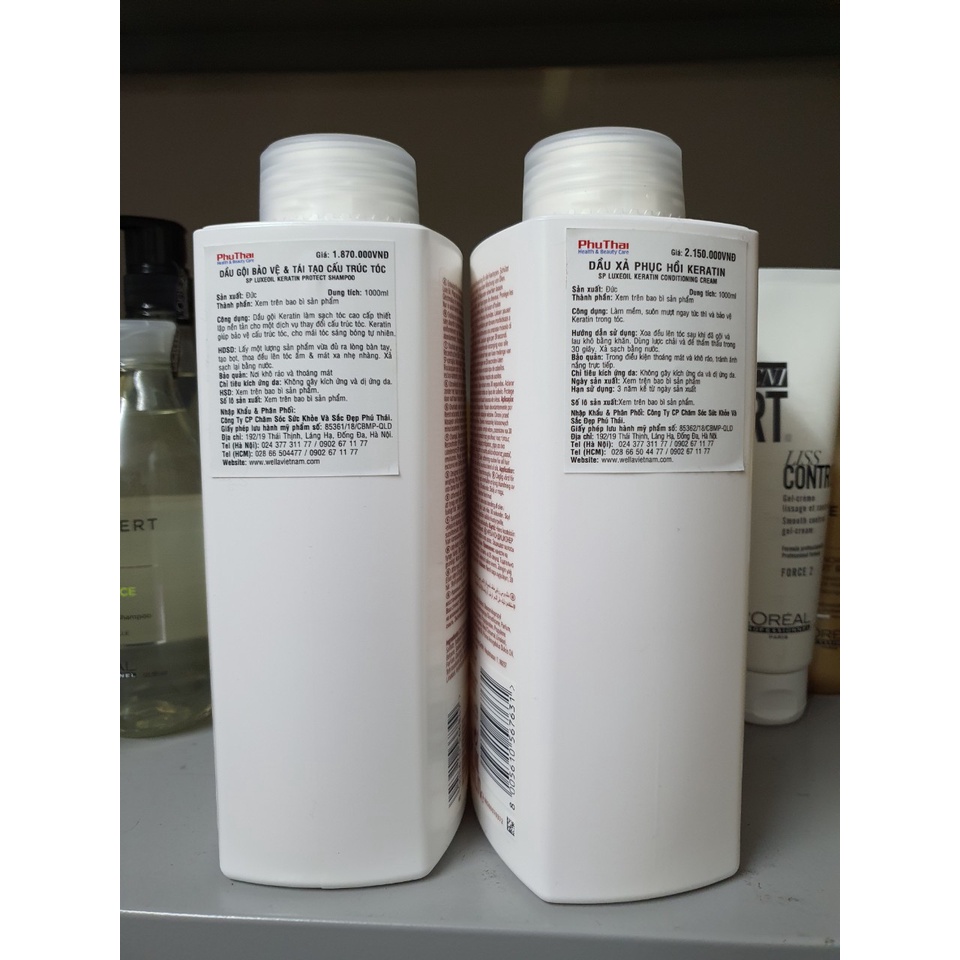 Dầu gội xả  SP LUXE OIL WELLA phục hồi tóc hư tổn 1000ml