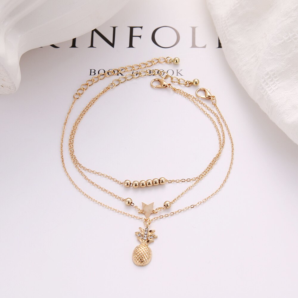 [Mã FAMAYFA giảm 10K đơn 50K] Lắc chân nhiều lớp màu vàng phối mặt hình ngôi sao năm cánh và quả dứa thời trang | BigBuy360 - bigbuy360.vn