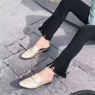 Quần jean ống loe xẻ tà