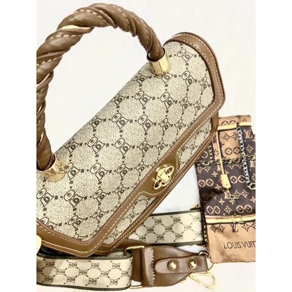 Túi xách khoá bông quai xoắn