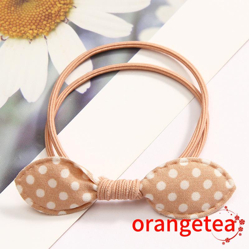 Dây buộc tóc đính nơ họa tiết chấm bi dễ thương cho bé gái