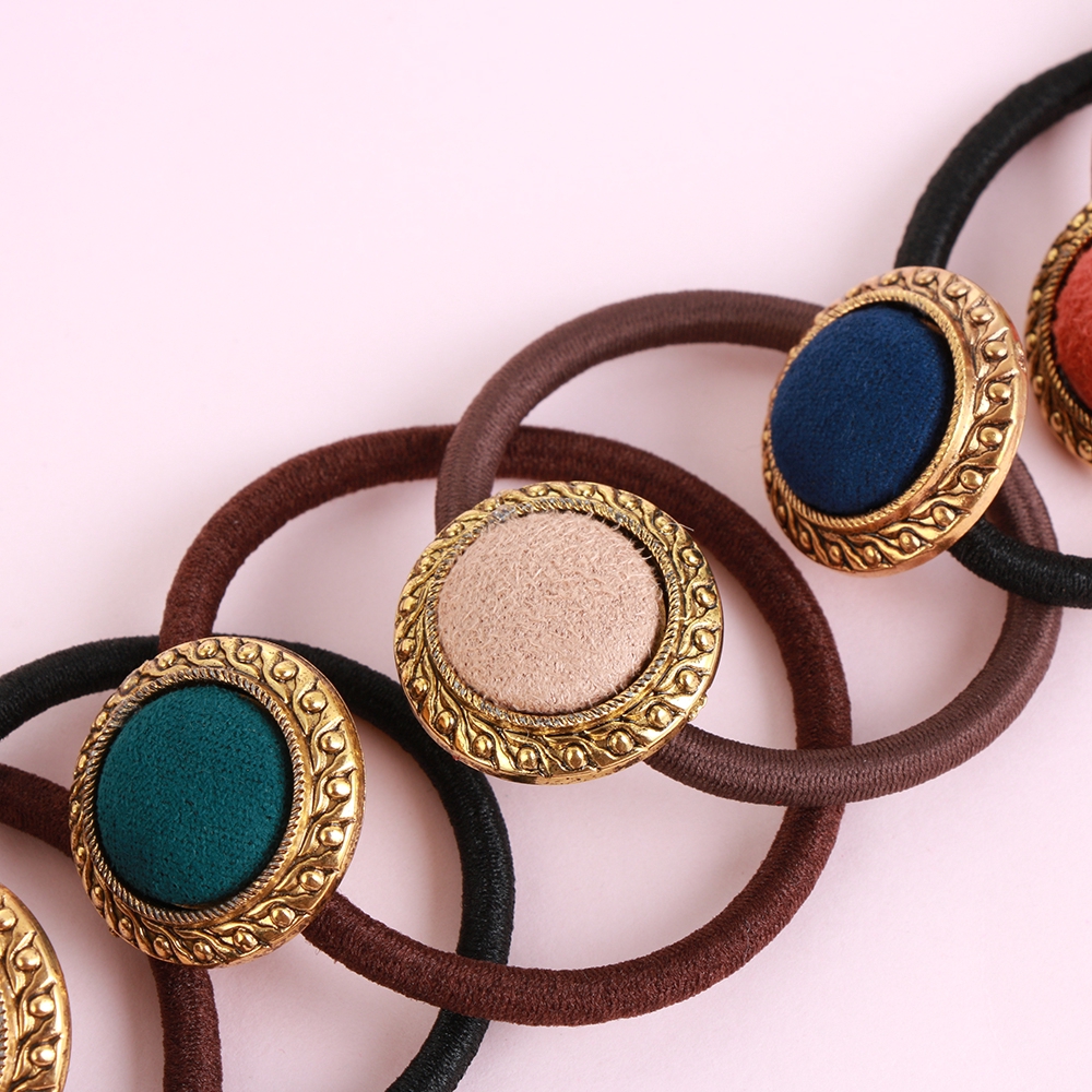 Cài tóc đính nút thời trang nữ tính