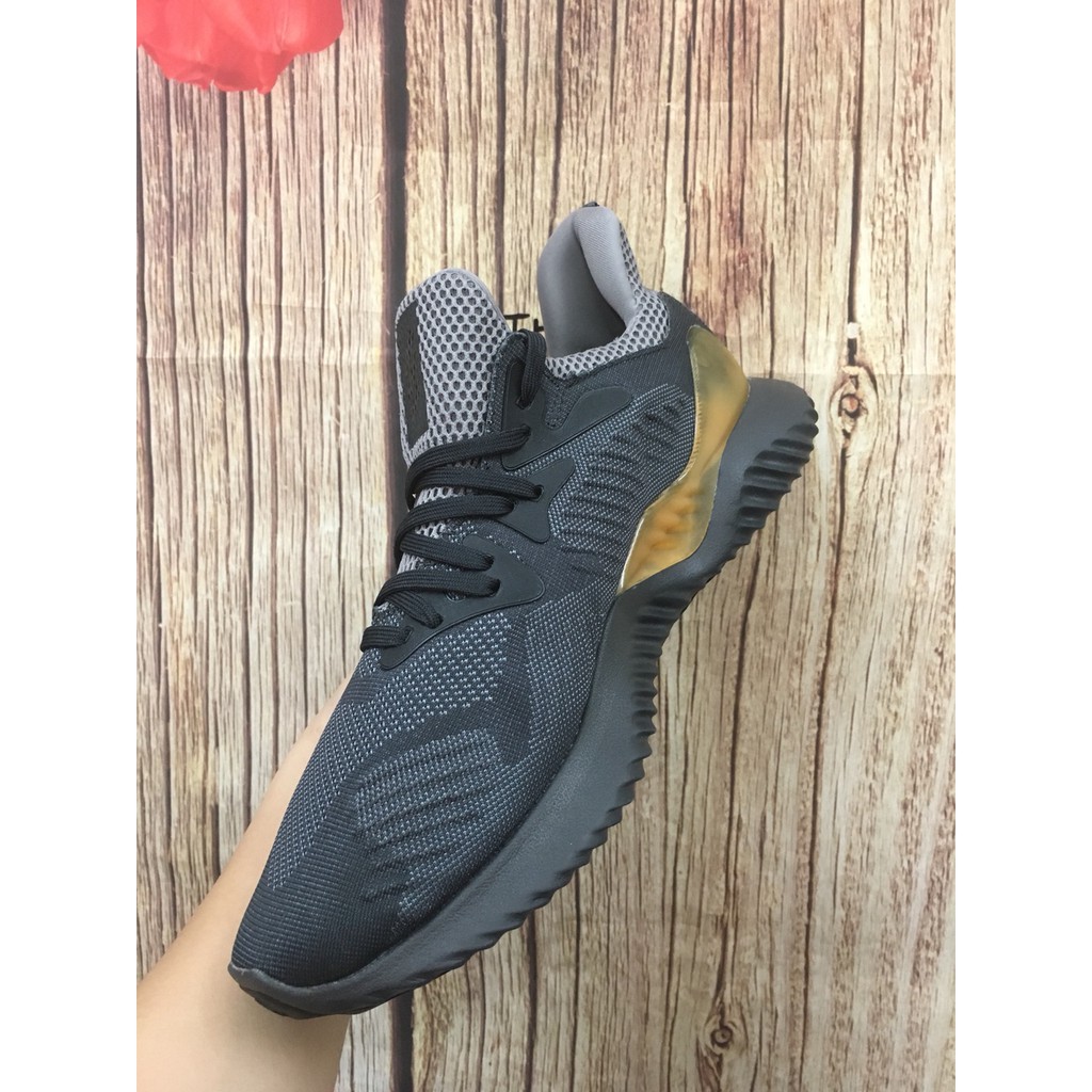 Giày thể thao sneaker Alphabounce xám gót vàng bản trung Hot trend