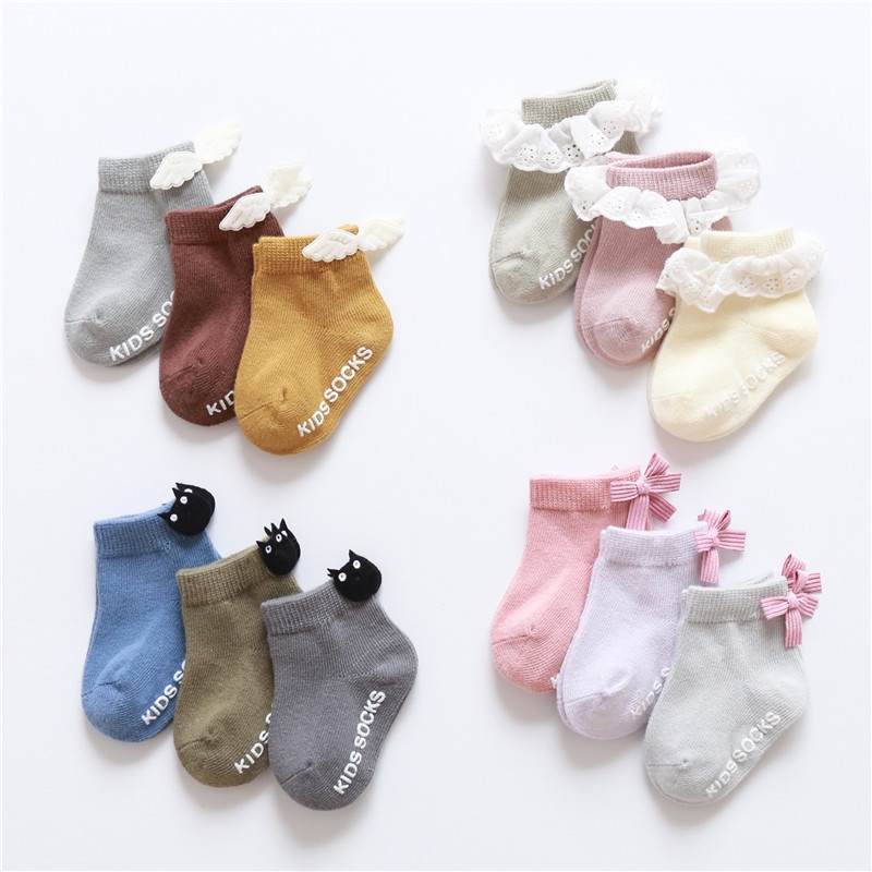 Set 3 đôi tất cotton mềm mại chống trượt đính nơ dễ thương cho bé sơ sinh 0-12 tháng tuổi
