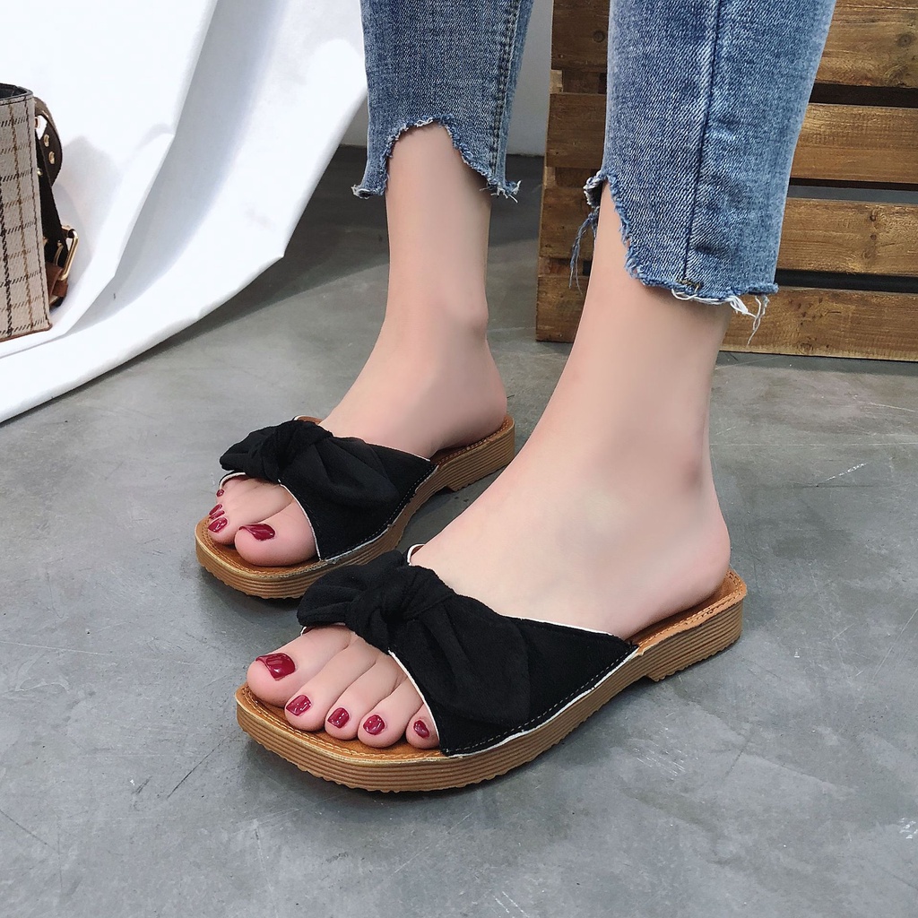 Mới dép đế bệt và dép đi trong nhà của phụ nữ thời trang mùa hè mặc bên ngoài nơ một từ kéo phiên bản Hàn Quốc dép lười