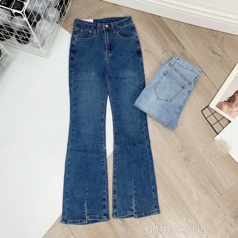 quần jean ống loe xẻ giữa kéo chân