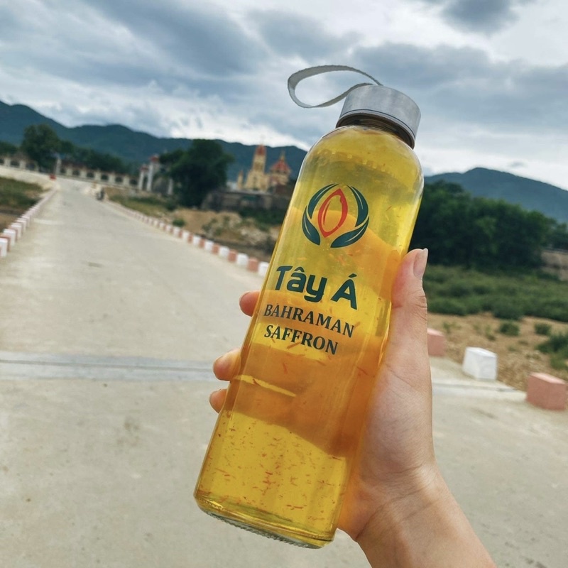 Chai thủy tinh 500ml có logo Tây Á có dây treo