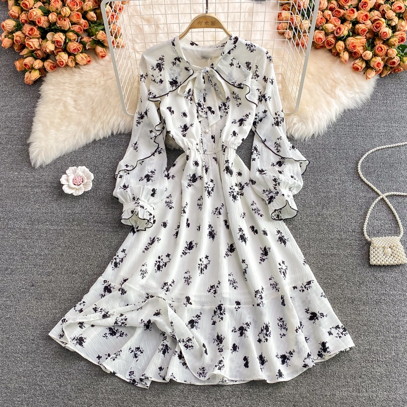Đầm tay dài hoạ tiết hoa đen màu trắng ngà có đủ size chất voan có 2 lớp