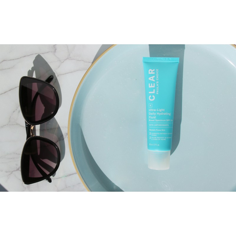 Kem và sữa dưỡng da chống nắng SPF 30 da mụn Paula's Choice Clear Ultra Light Daily Fluid SPF 30 60ml | BigBuy360 - bigbuy360.vn