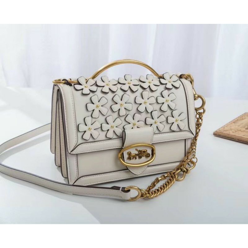 Túi xách Coach hoa Riley Top Handle 697