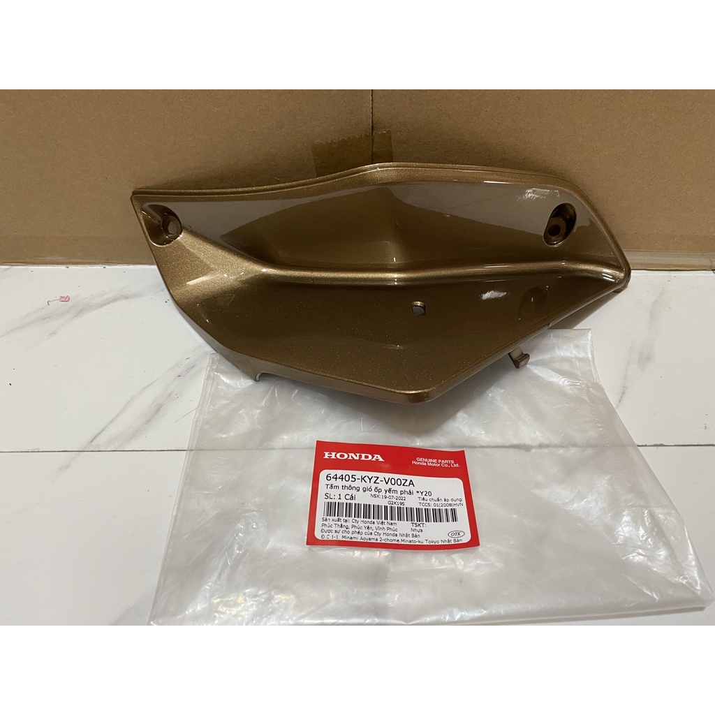 Tấm thông gió ốp yếm phải HONDA FUTURE125 năm 2012-2013-2015 màu Nâu.