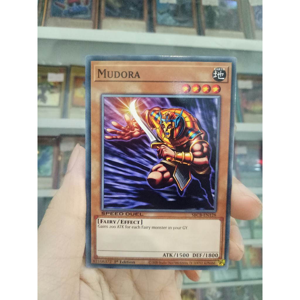 Thẻ Bài Lẻ YugiOh! Mã SBCB-EN128 - Mudora - Common - 1st Edition