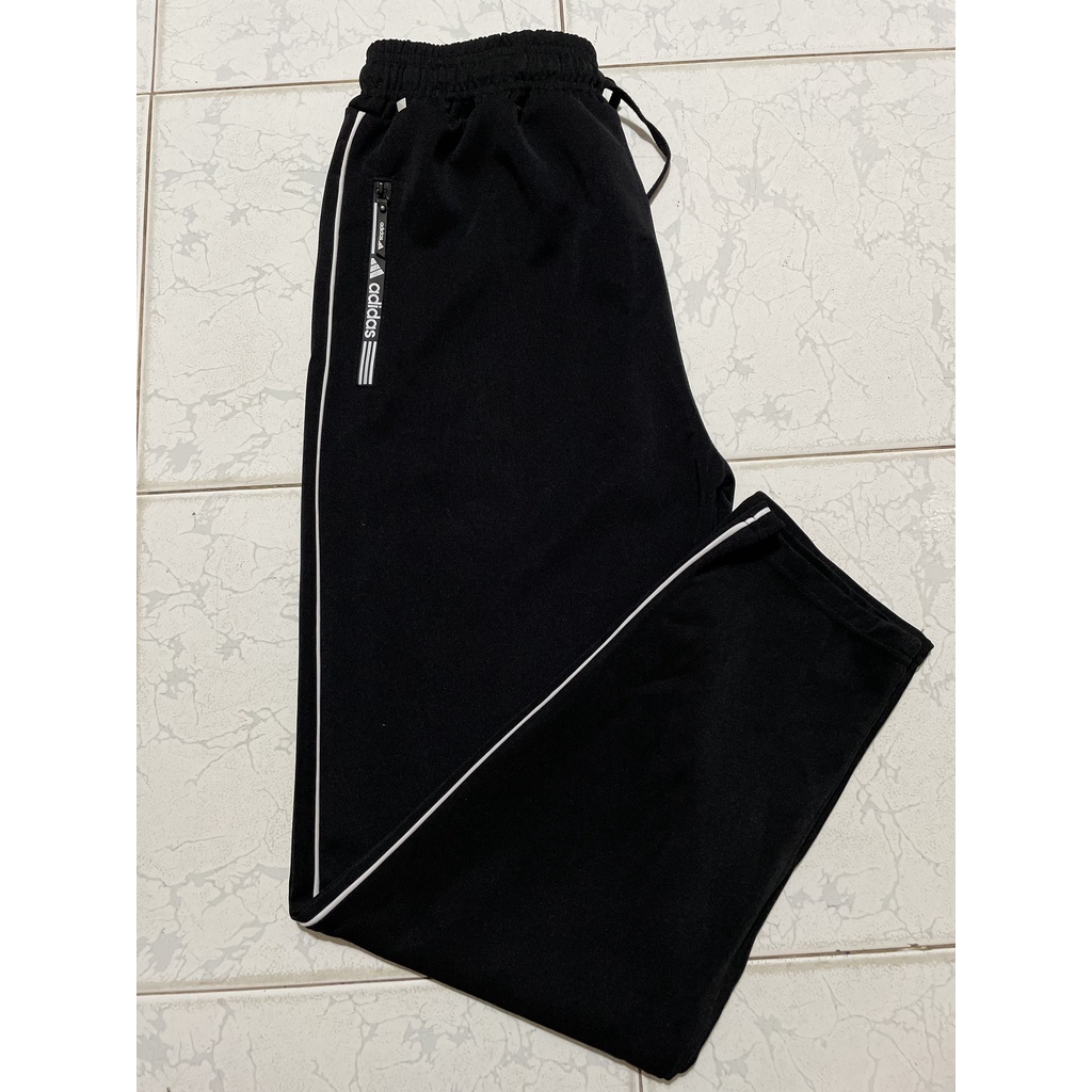 Quần Jogger Nam Nữ phối Sọc ống SUÔNG có KHÓA KÉO, thun Poly. Phong Cách Thể Dục Thể Thao Năng Động Cá Tính Unisex.