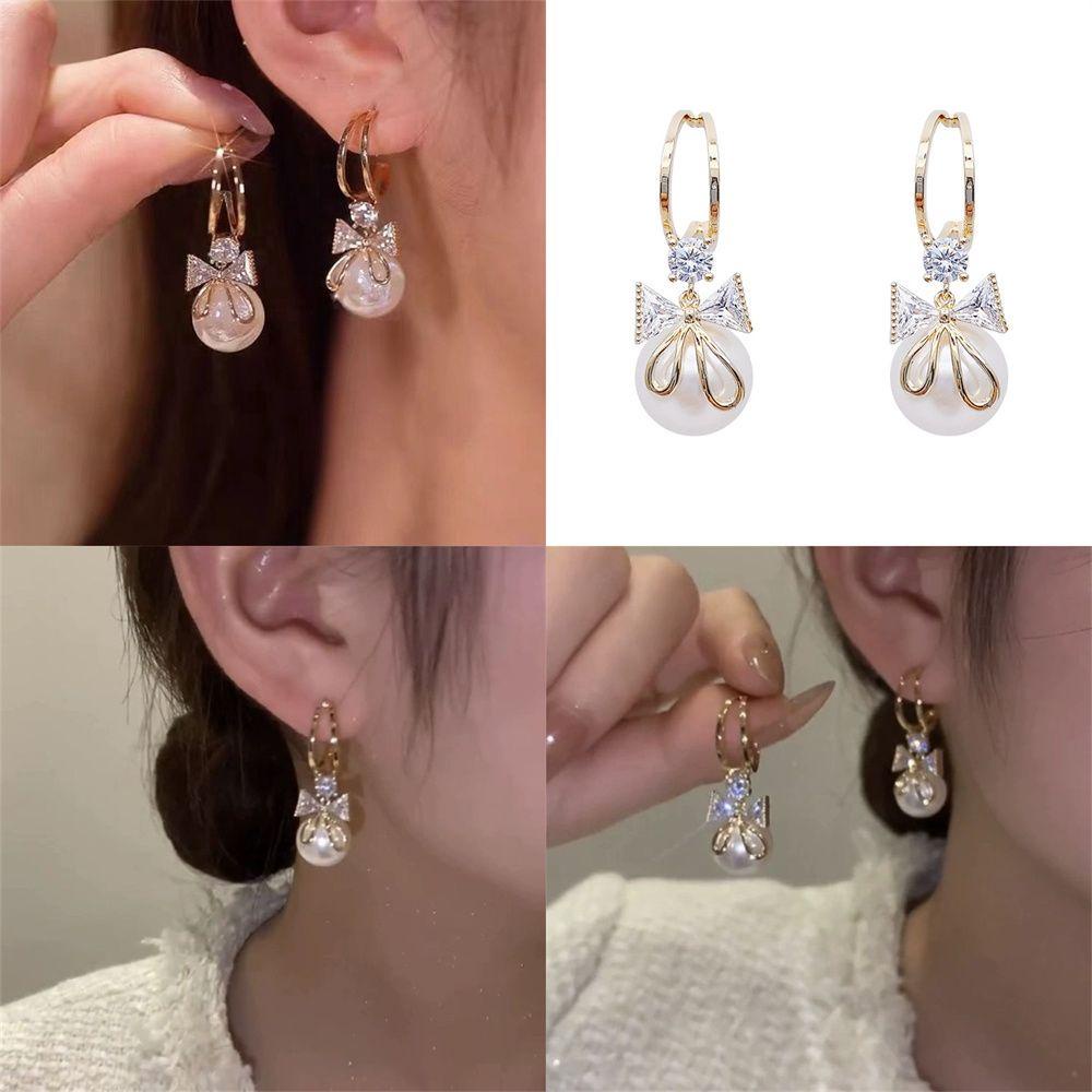 Khuyên Tai Thắt Nơ Chữ C Đính Ngọc Trai Đơn Giản