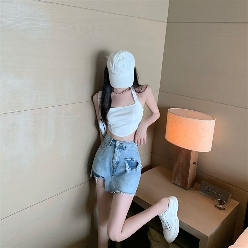 Chân váy denim siêu ngắn ngang hông cạp cao phối lỗ không đồng đều phong cách mùa hè 2022 cho nữ