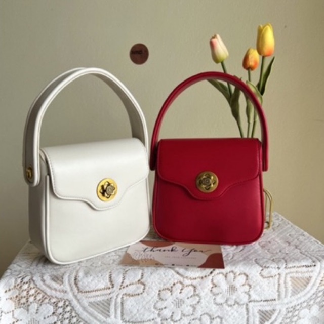 Túi xách thiết kế cao cấp khoá cài bông hoa - HAKEN