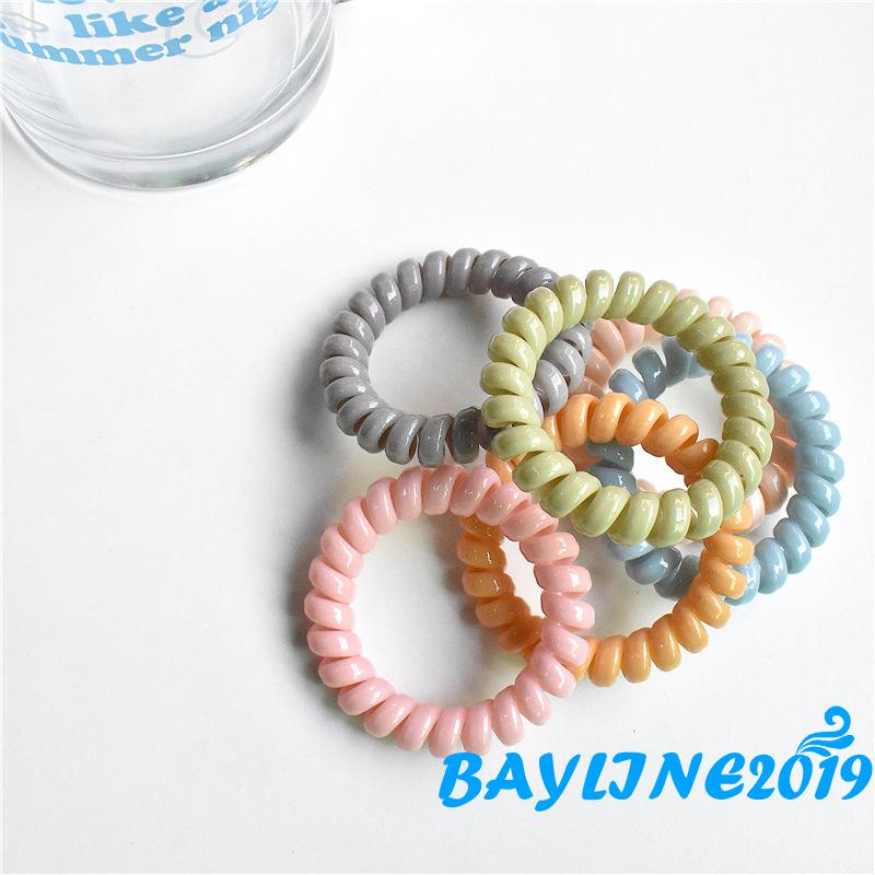 Dây buộc tóc co giãn màu trơn xoắn ốc không để lại dấu vết cho nữ