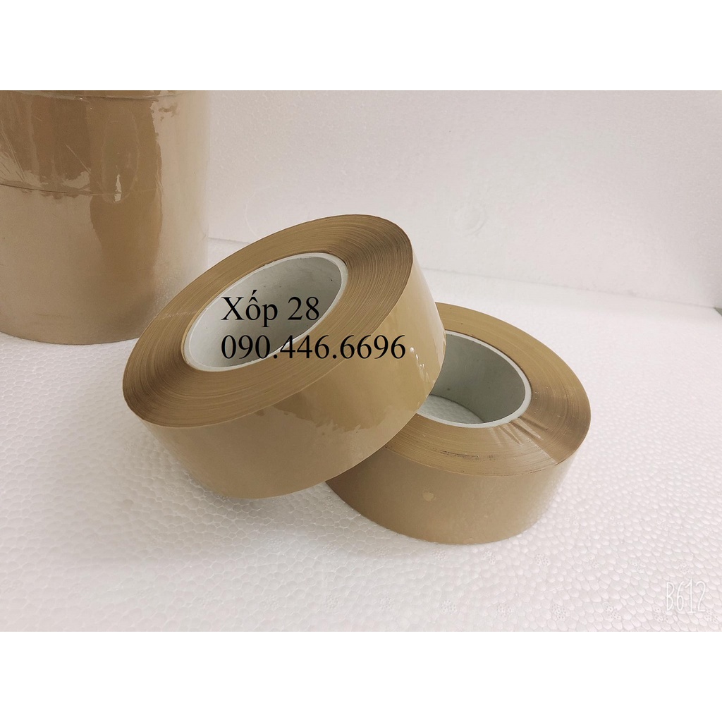 Băng dính đục lõi nhựa 3 ly 0.6kg / cuộn đóng gói hàng hóa thùng xốp thùng carton thùng bìa