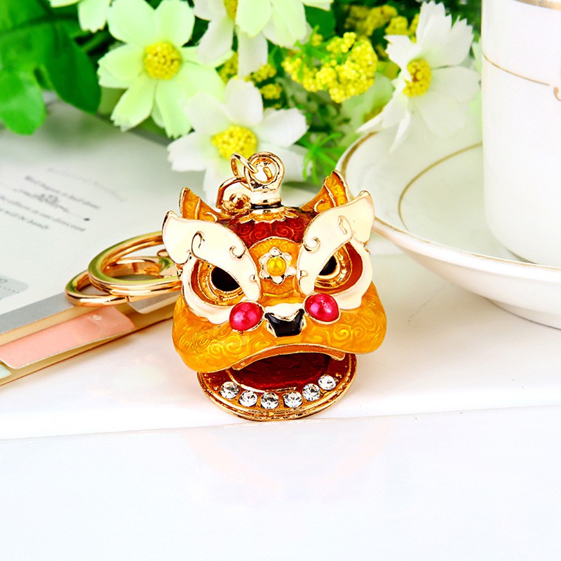 Móc khóa hình đầu sư tử đính đá xinh xắn
