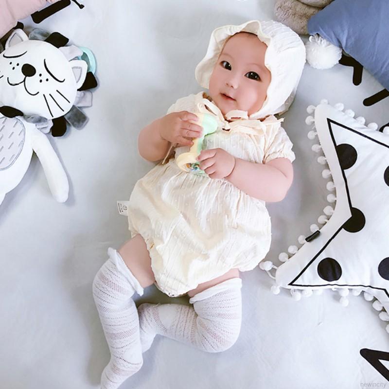 Set jumpsuit cổ tròn tay phồng + nón cho bé