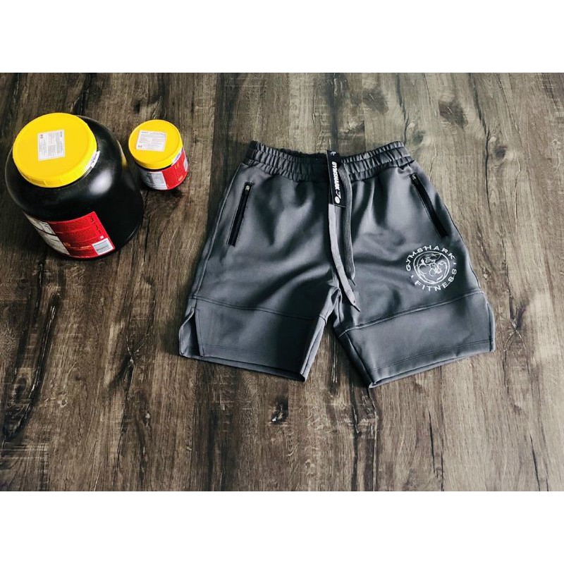 Quần đùi GYMSHARK logo tròn xẻ tà